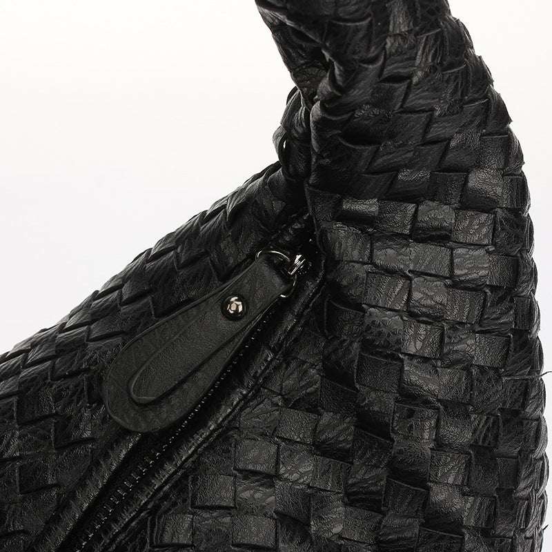 Vevd ensfarget skulderveske for damer