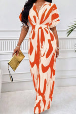 V-hals Jumpsuit Dame – Elegant Helkroppsprint med Vide Ermer
