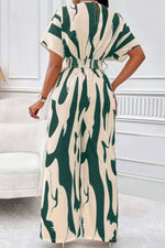 V-hals Jumpsuit Dame – Elegant Helkroppsprint med Vide Ermer