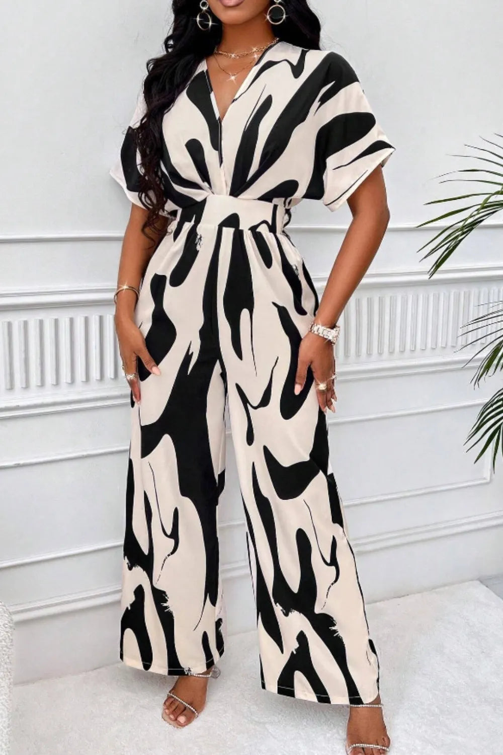V-hals Jumpsuit Dame – Elegant Helkroppsprint med Vide Ermer