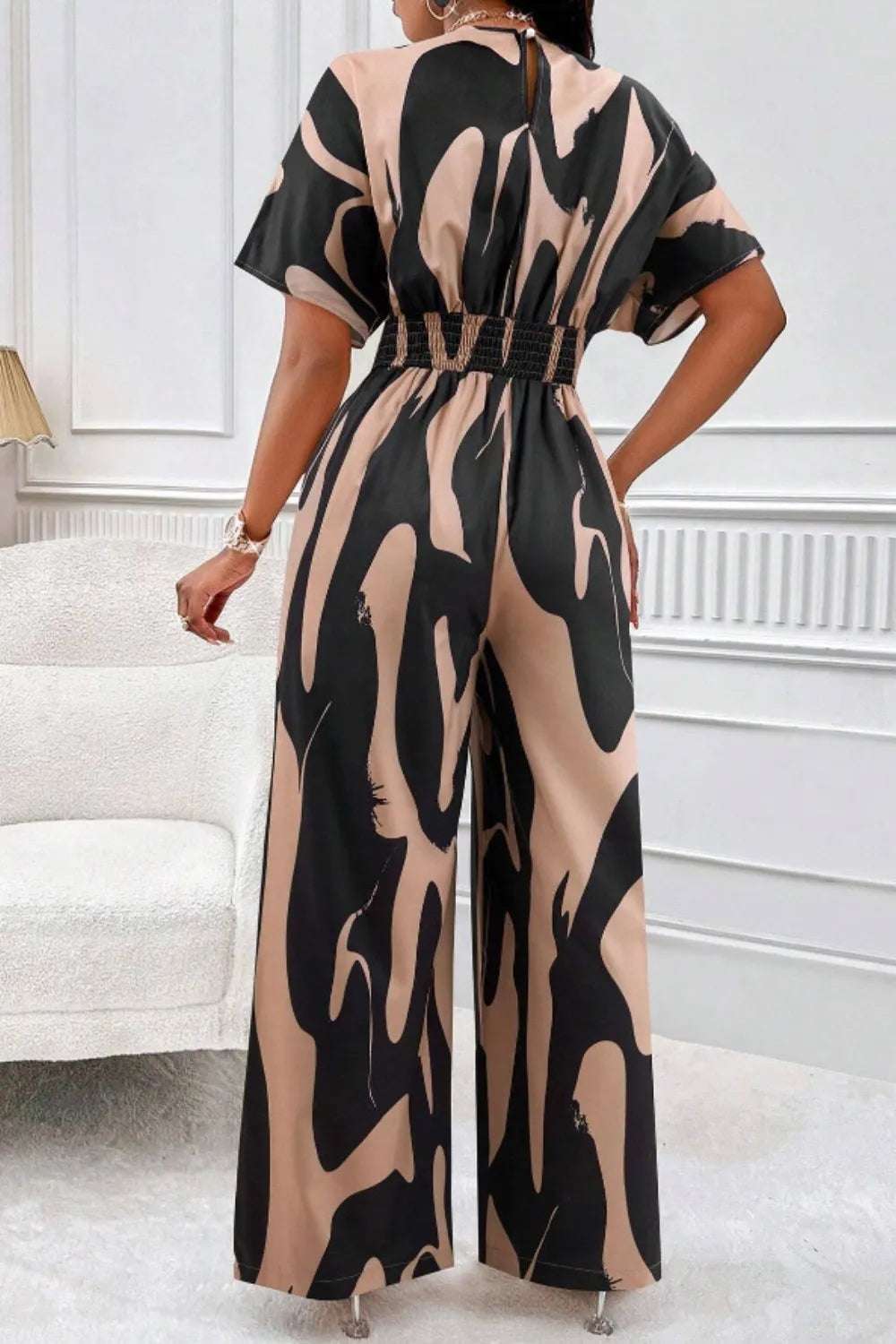 V-hals Jumpsuit Dame – Elegant Helkroppsprint med Vide Ermer