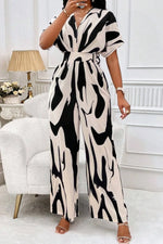 V-hals Jumpsuit Dame – Elegant Helkroppsprint med Vide Ermer