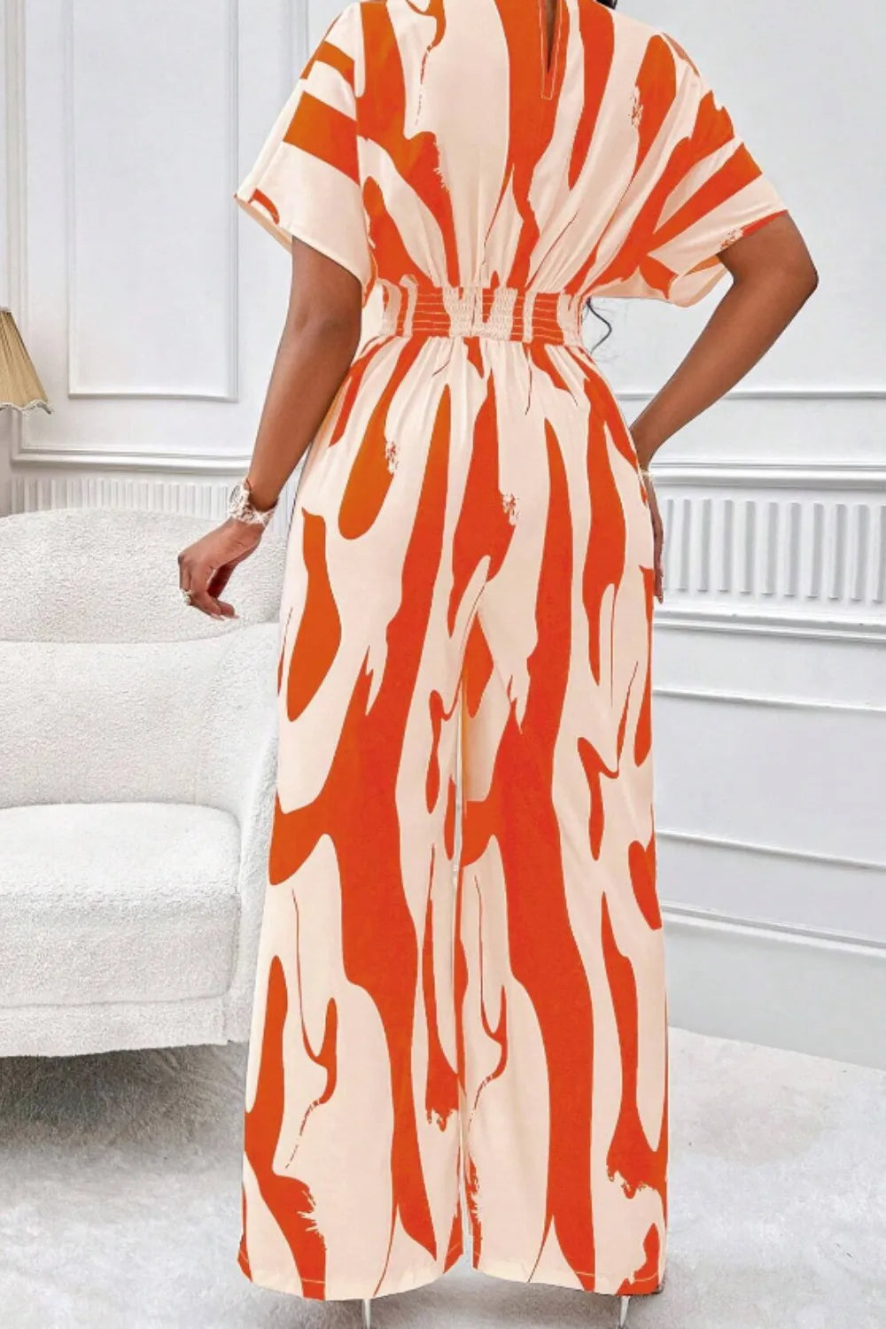 V-hals Jumpsuit Dame – Elegant Helkroppsprint med Vide Ermer