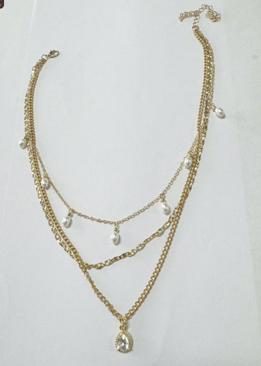 Elegant Flerlags Halskjede i Gull - Minimalistisk Smykke for Kvinner 123